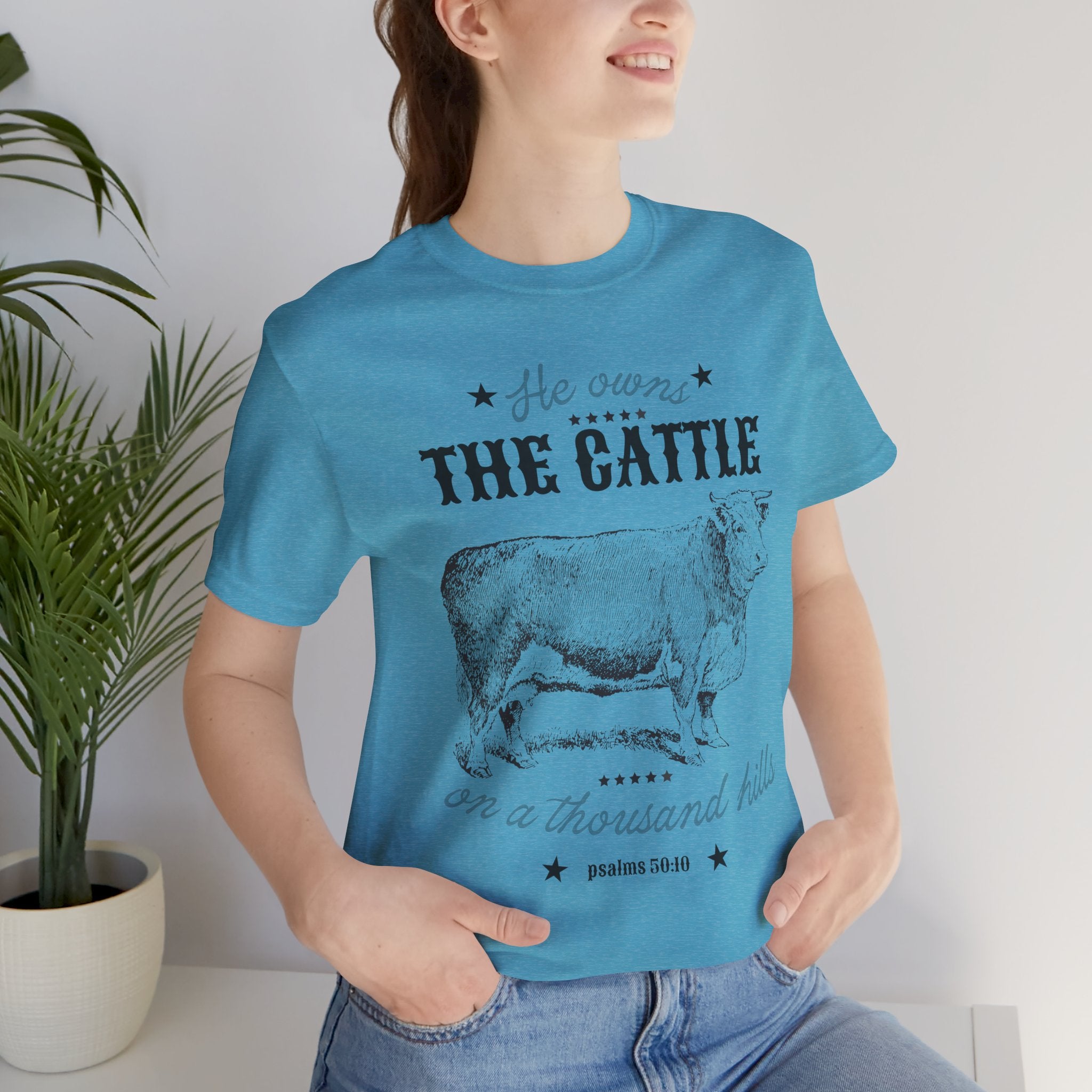 Vintage Cow Graphic Tee — "He Owns The Cattle" Rustic Farm Shirt (Psalm 50:10)