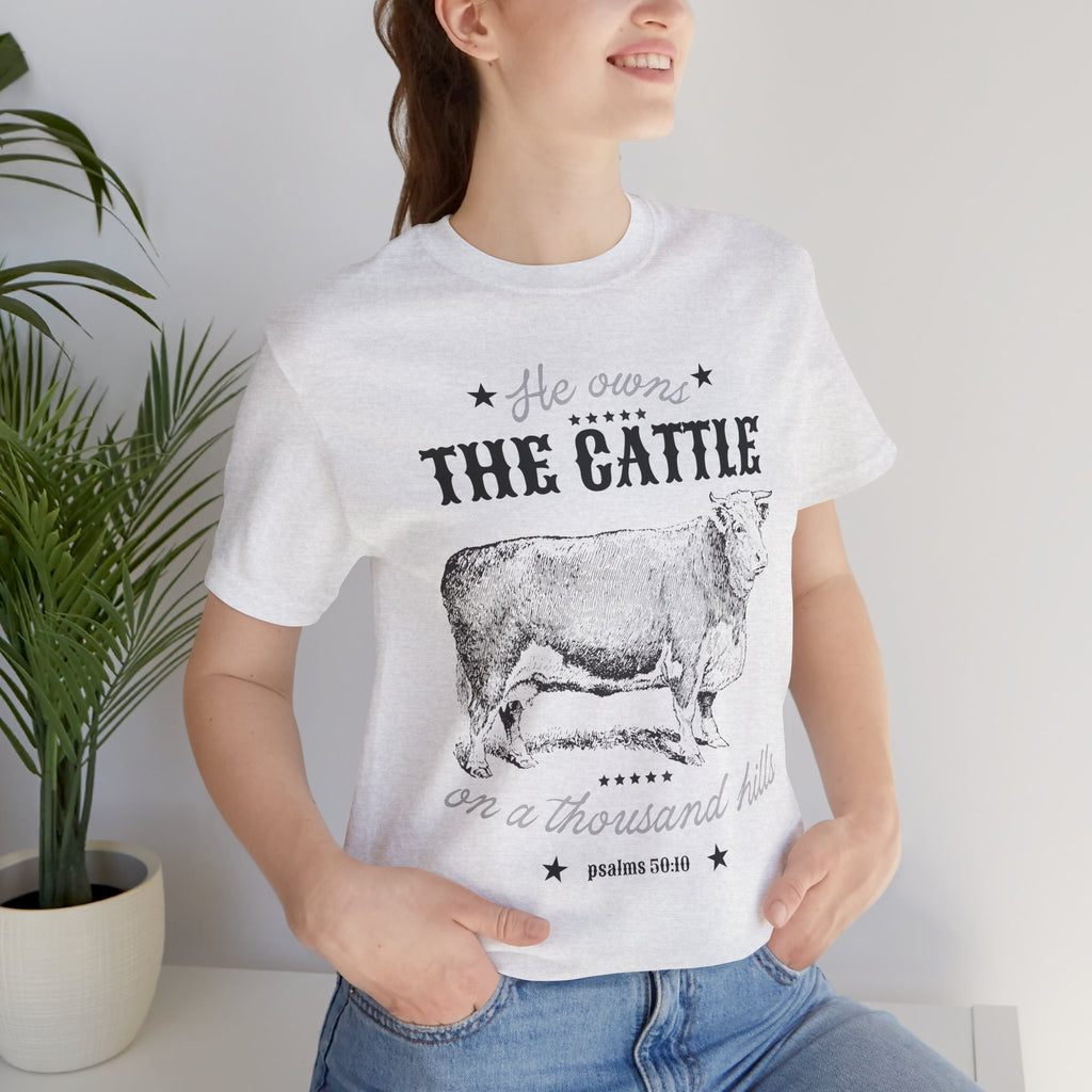 Vintage Cow Graphic Tee — "He Owns The Cattle" Rustic Farm Shirt (Psalm 50:10)