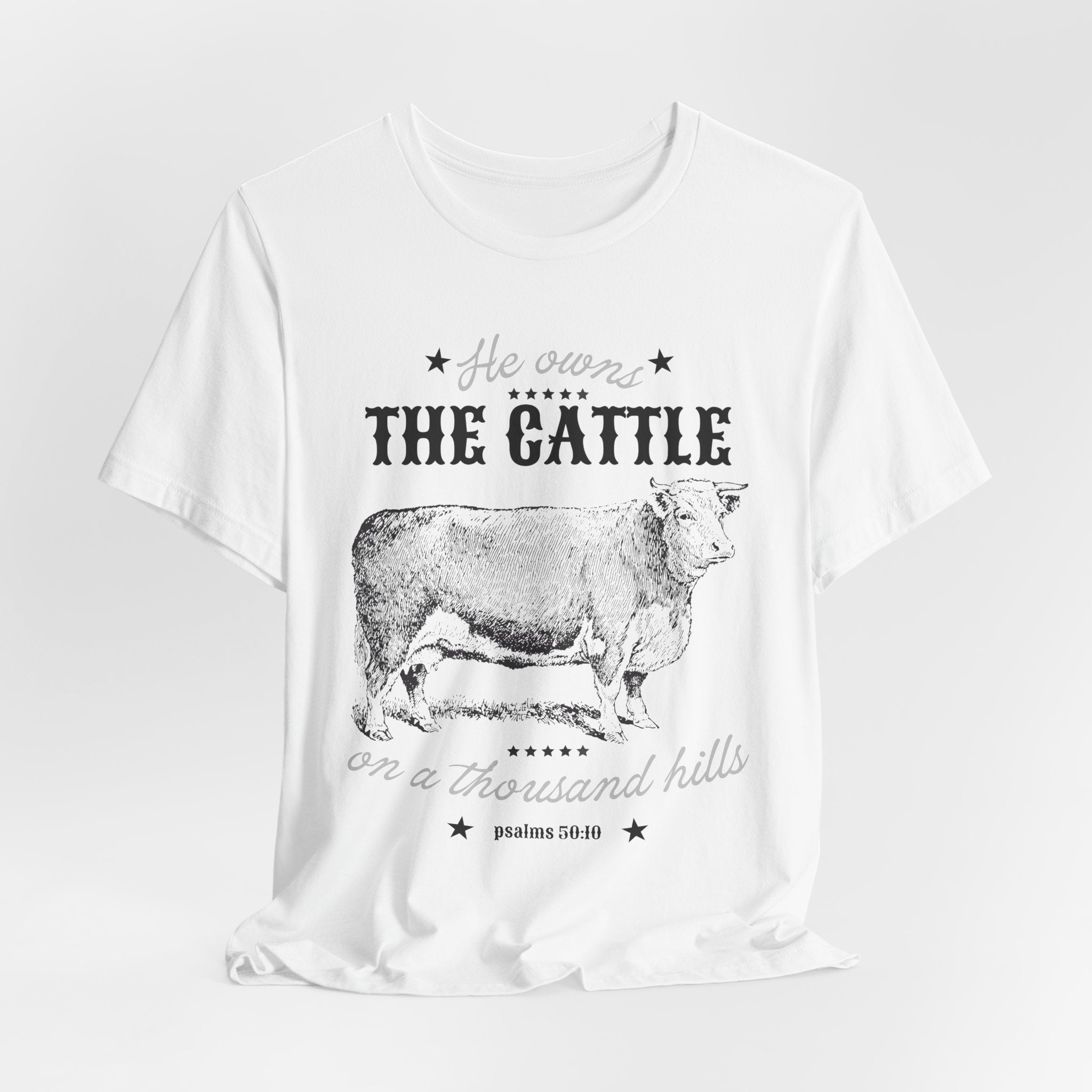 Vintage Cow Graphic Tee — "He Owns The Cattle" Rustic Farm Shirt (Psalm 50:10)